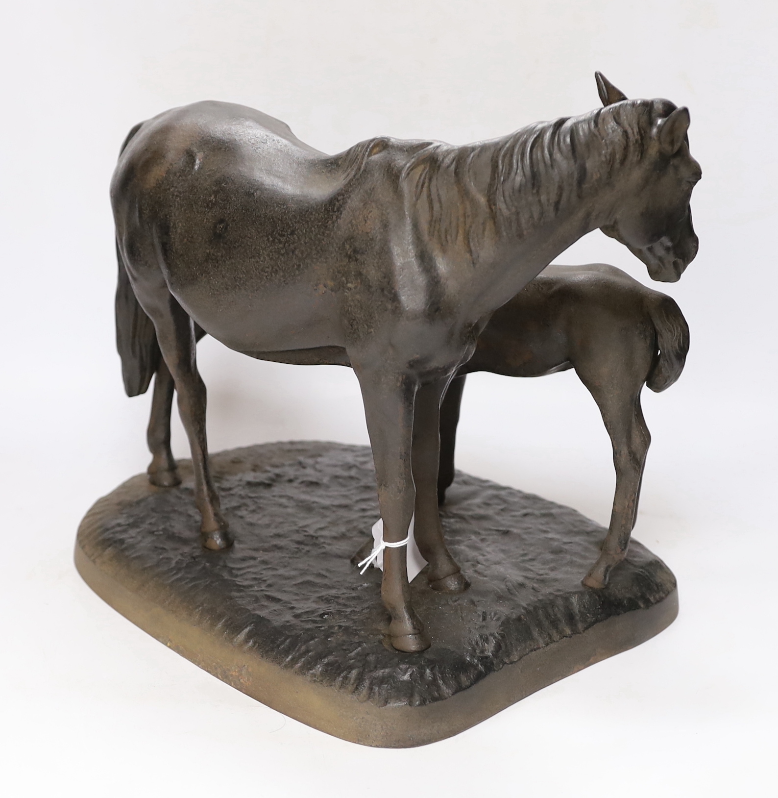 A 1970's Russian cast iron horse group of mare and foal, 35cm wide